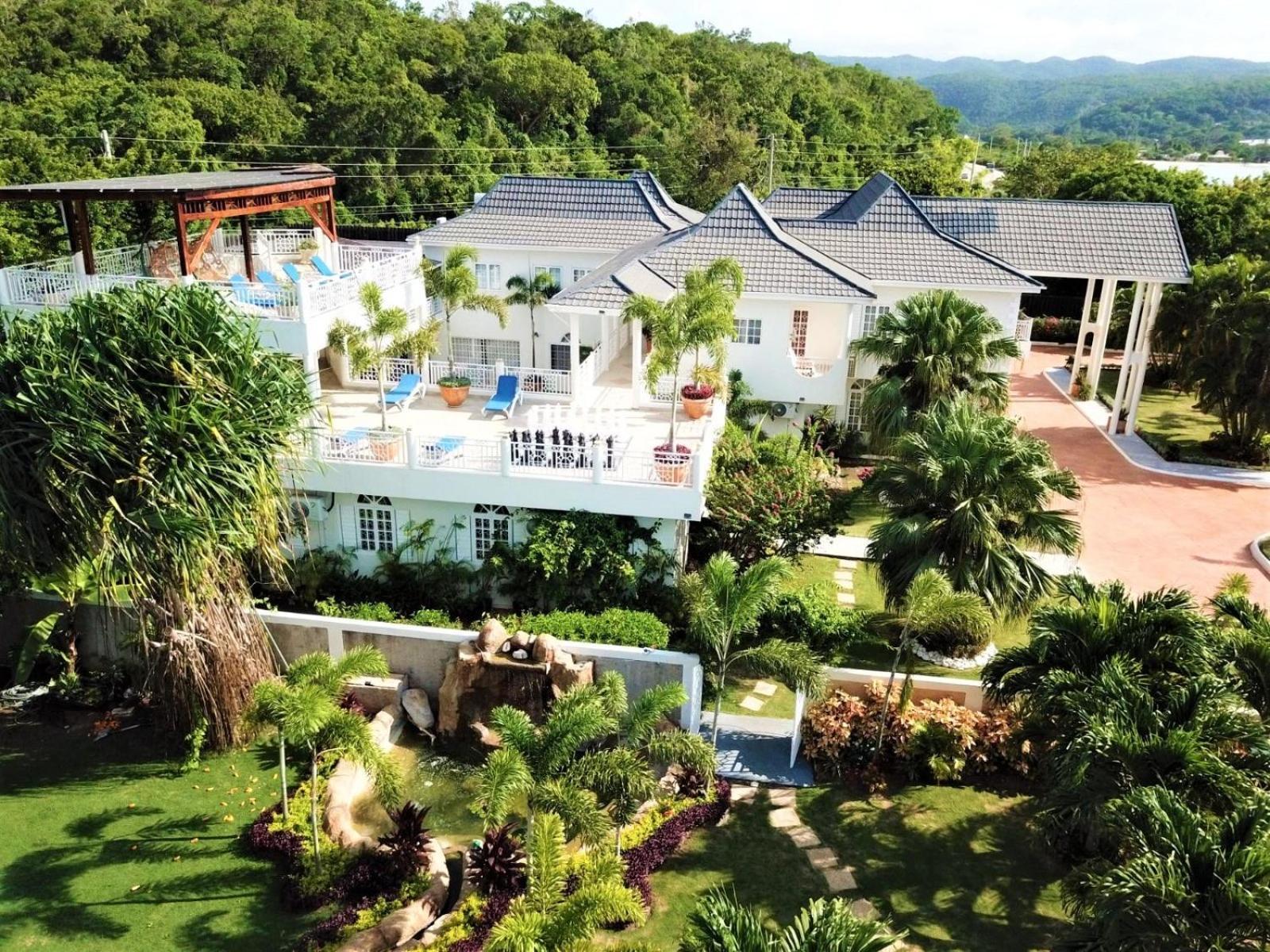 Mais Oui Villa Discovery Bay Exteriör bild